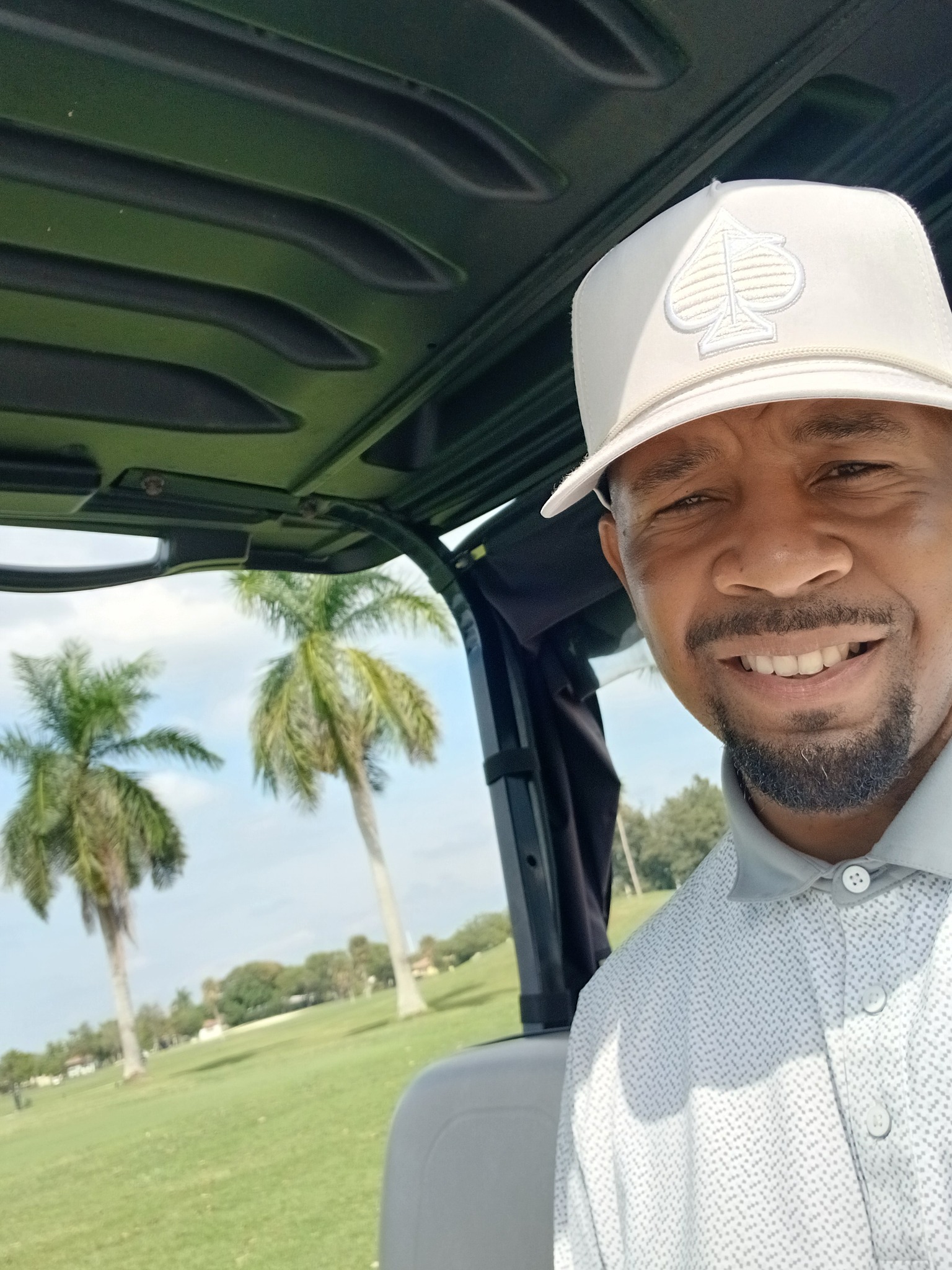 Dominique Bailey, NCC, outdoors on a golf course